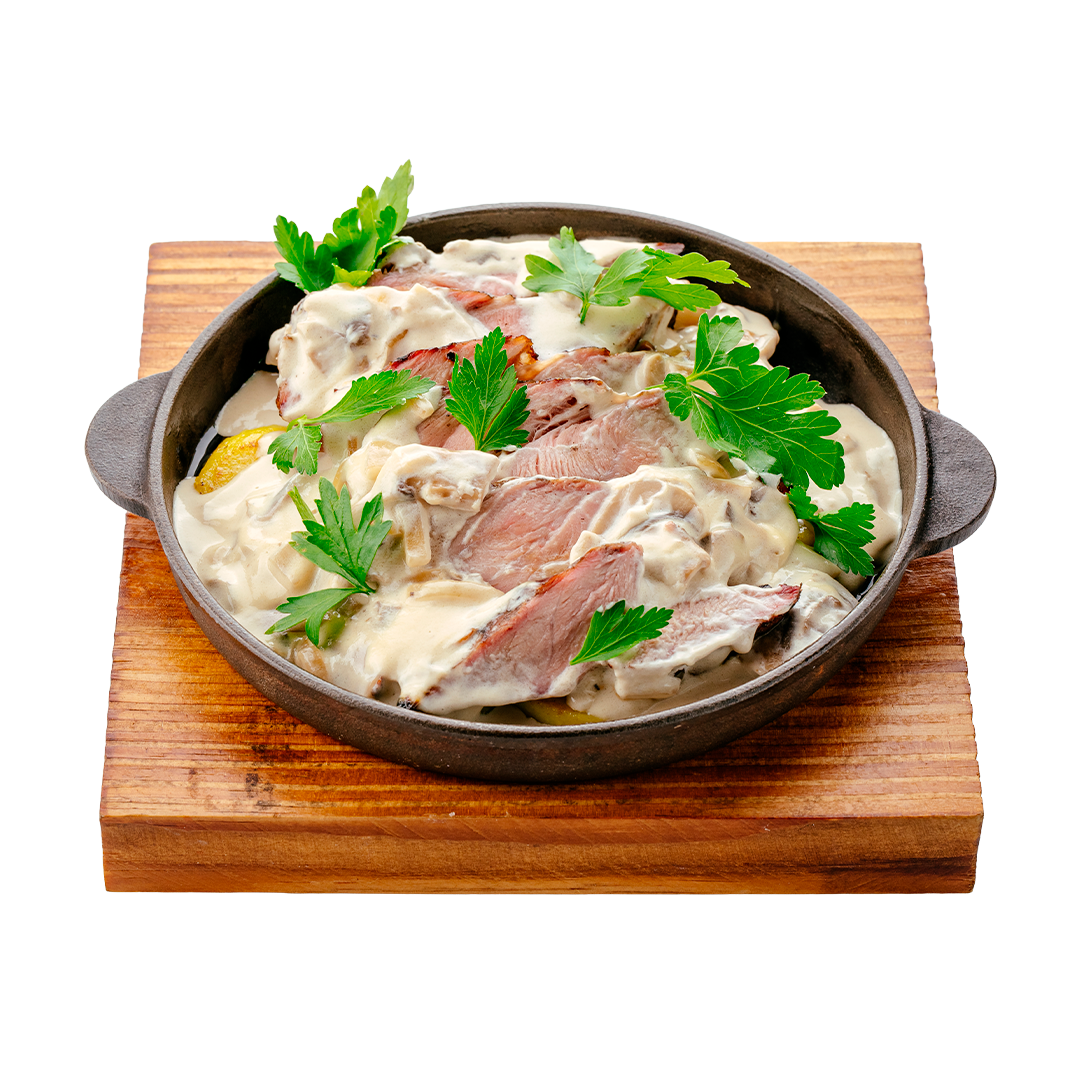 Свиная шея томлёная с грибным соусом